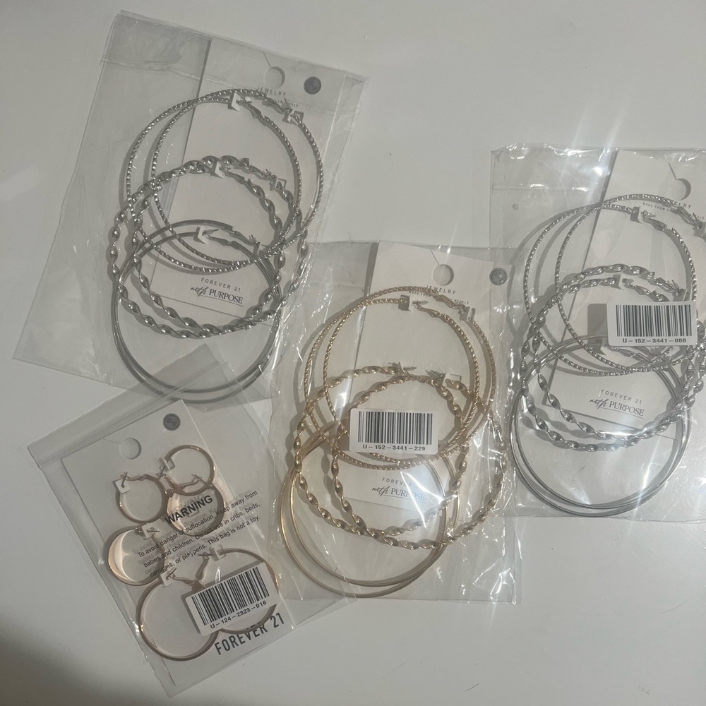 Lot of gold and silver hoop earrings 12 pairs total